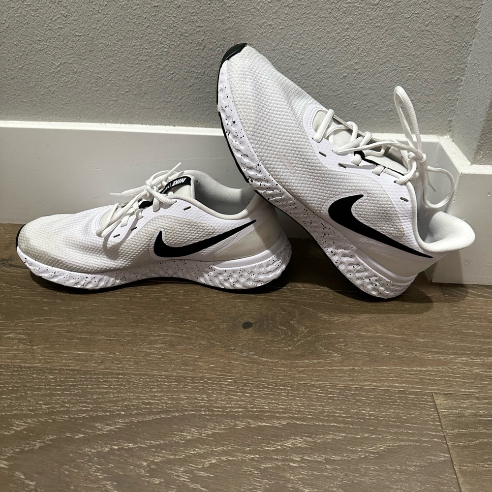 Nike White Sneakers with Black Logo